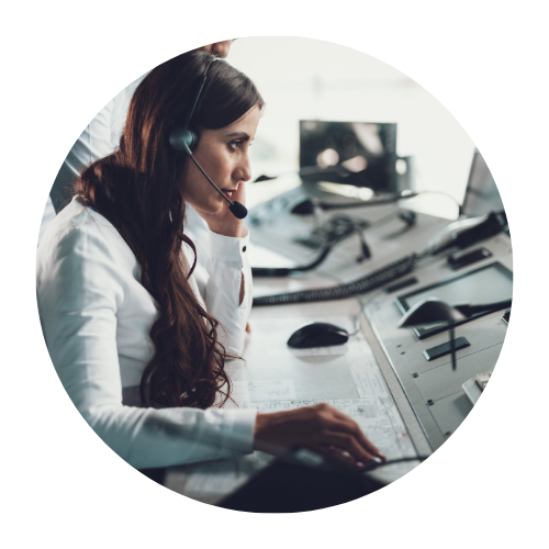 A person with long hair, wearing a white shirt, is seated at a desk with various electronic devices and papers. The individual appears to be engaged in work that involves technology or analysis.

Mission Control NOC and HelpDesk, Helpdesk Services, SLA, MSP, Outsources MSP, MSP Services, Helpdesk, IT Services